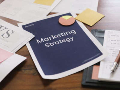 Marketing strategy report on a desk